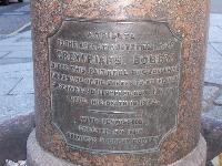 The wording on the statue.