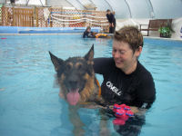 Angela Griffiths helps a dog enjoy hydrotherapy at Greyfriars.