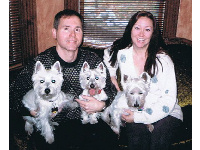 Sid with husband, Anthony, and, from left, Keely, Blanche, and her dearly departed Mortimer.