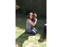 Toni with a friends dog, Rosie. Photo taken by Anne Carter, Labrador Lifeline Trust.