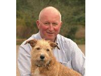 Dr Roger Mugford and canine friend.