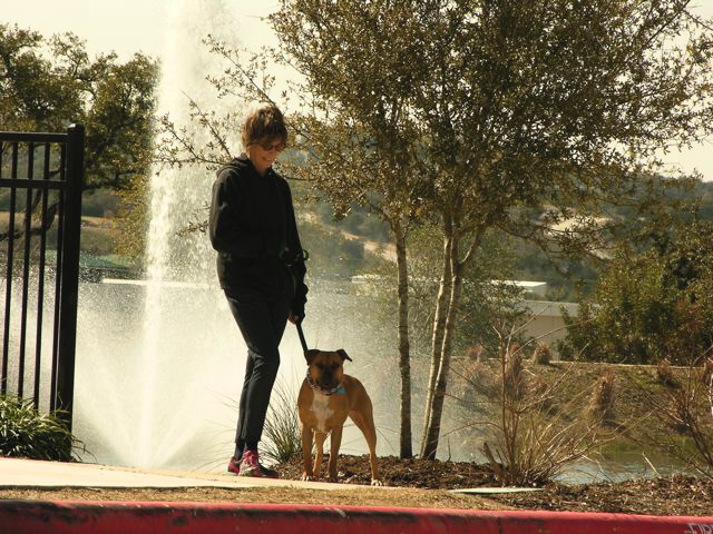 Cindy with one of her beloved Pit Bulls.