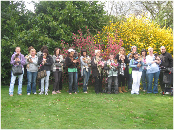 The Ruby Scrumptious group having fun with their toy dogs.